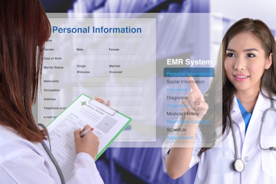 Doctor viewing patient data with EMR